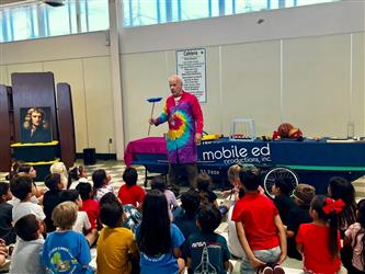 photo of mobile ed presentation to students attending summer program